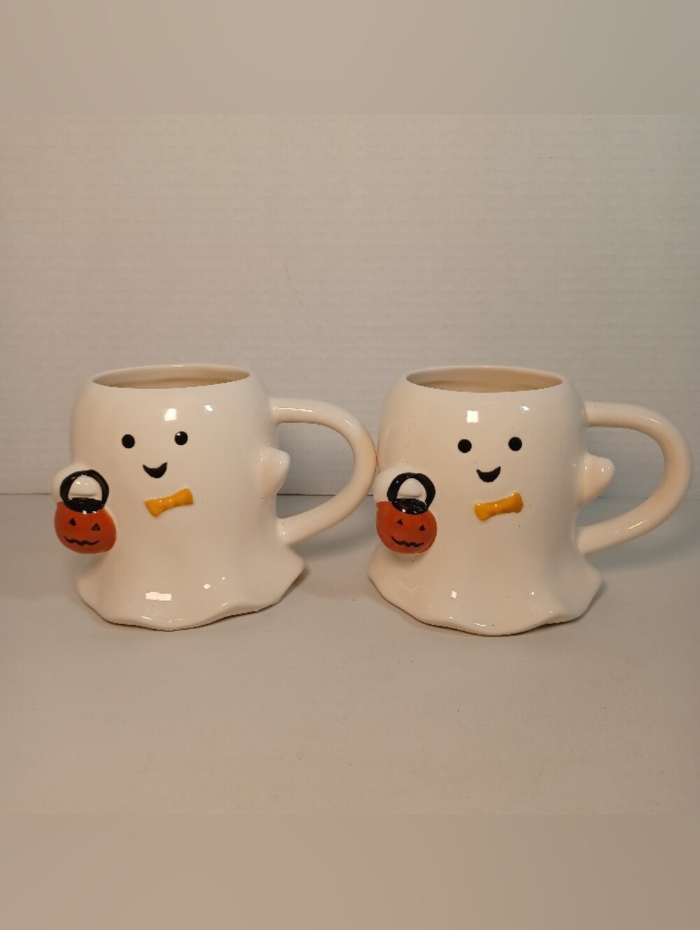 White Ghost Halloween Ceramic Mug Holding Pumpkin Set of 2 Hyde and Eek Bootique